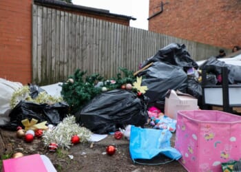 Fury as mountains of Christmas rubbish pile up on the streets of Birmingham after nearly 12 months of bin strikes