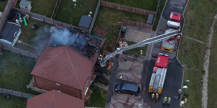 Tragedy as girl dies in horror house fire and another child rushed to hospital as fire crews battled to tackle the blaze