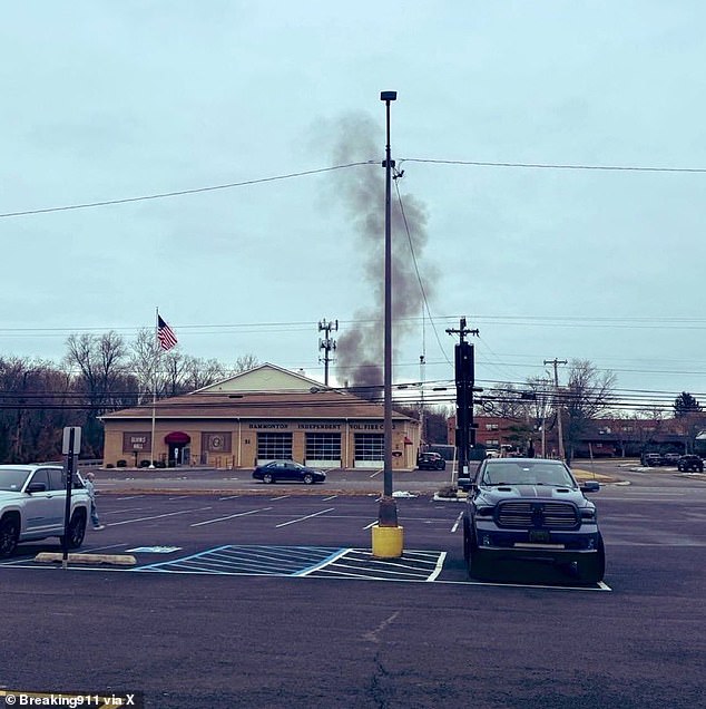 Eyewitness footage posted on social media from a nearby Tractor Supply parking lot shows thick black smoke rising over the crash site