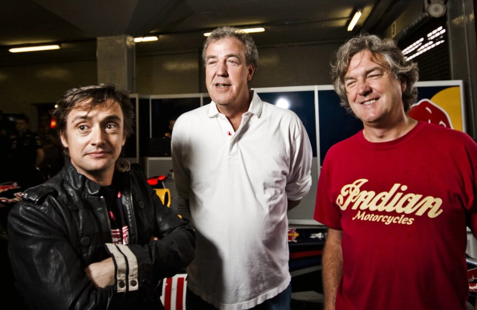 British TV personalities Richard Hammond, Jeremy Clarkson, and James May from Top Gear at the Kyalami Racetrack.