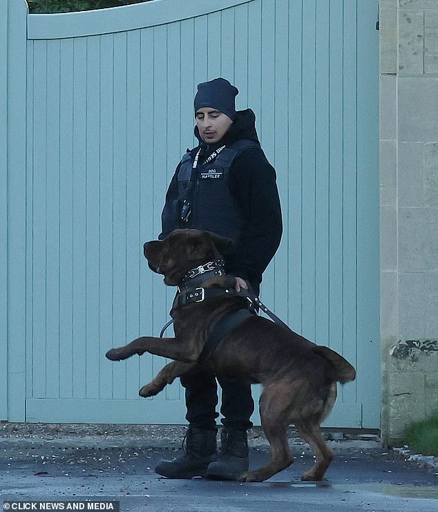Guests, which included the likes of David and Victoria Beckham, were all required to wear mandatory wrist bands for security reasons (Security pictured at Wedding reception)