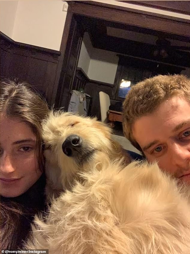 Romy is pictured with her dog, Billie, and Silberberg