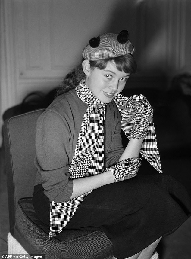 A very young Bardot (pictured in 1951) began her modelling career sporting relatively conservative fashion