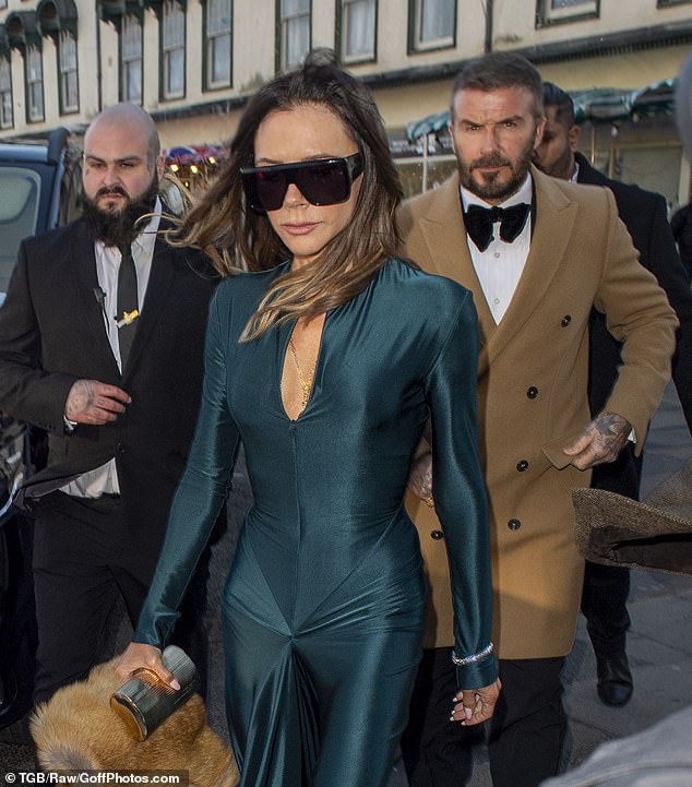 David and Victoria arrive for Holly Ramsay and Adam Peaty's wedding. Victoria wore one of her own frocks, a stylish £1,290 teal number