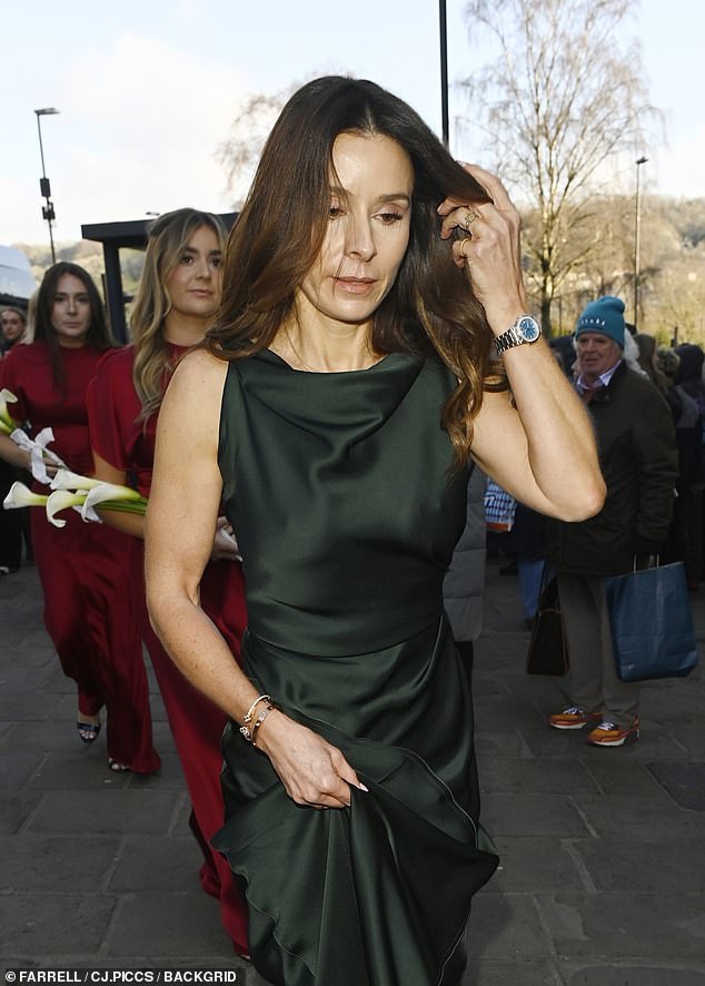 Mother of the bride Tana, 51, also stunned in a forest green gown by her fashion mogul friend