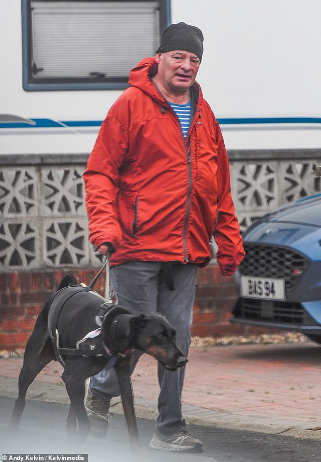 Adam's dad Mark was seen walking the dog near their Staffordshire home as he stepped out on Sunday, the day after the wedding