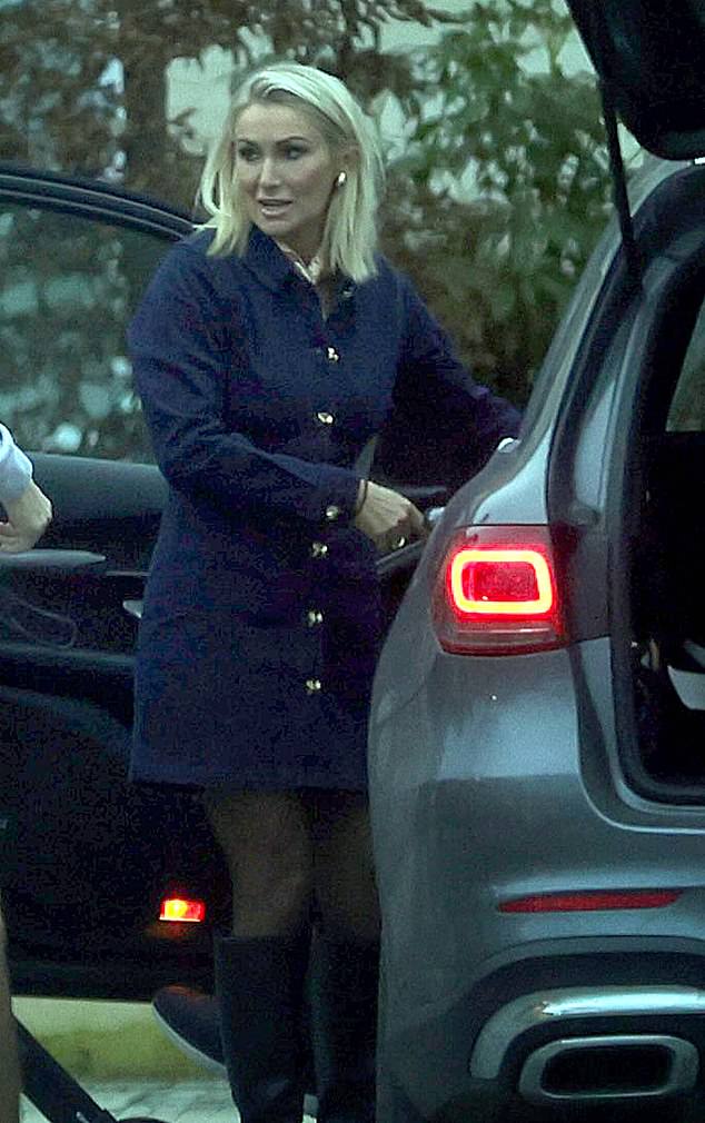 Katie accessorised with gold jewellery