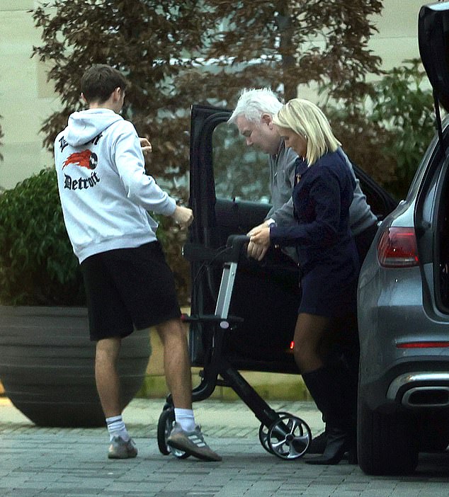The family were seen helping Eamonn out of the car