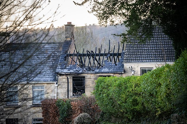 The burnt roof timbers of the house near Stroud