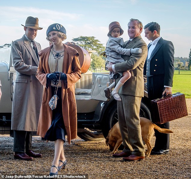 Discussing their upstairs-downstairs roles, Laura said: 'Yeah which is very funny how hard that is for people to get their heads around, but you know we were in lots of scenes together'; pictured Harry Hadden-Paton, Laura, Hugh Bonneville, Michael