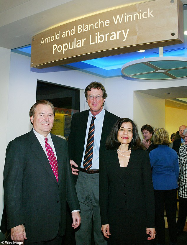 Gary Winnick, Michael Crichton and Karen Winnick attend a benefit for the Los Angeles Public Library Foundation in February 2003