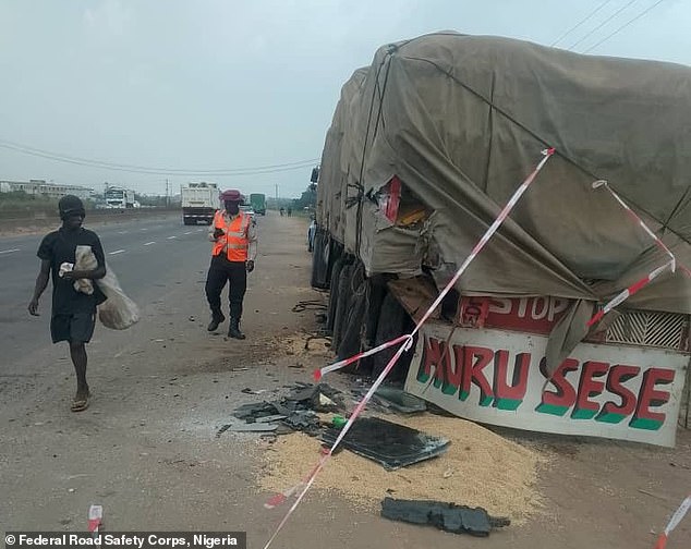 A large vehicle pictured with a tarpaulin draped over it on Monday afternoon. Five men are believed to have been involved in the crash overall