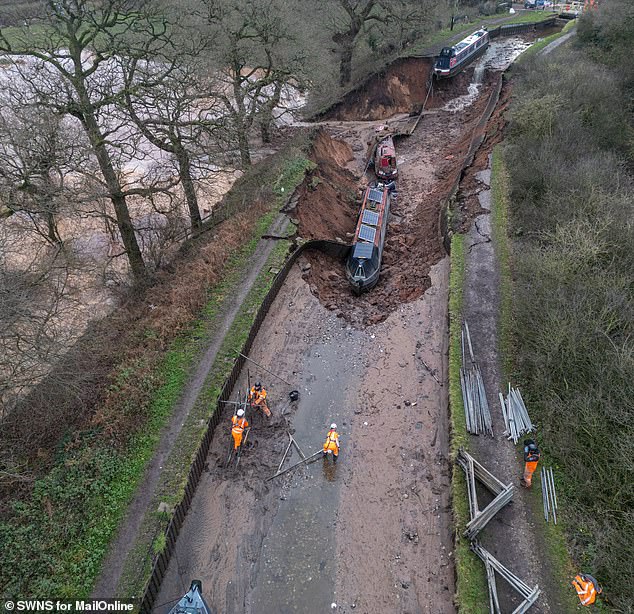 This morning, emergency workers in orange high-vis vests were pictured positioning boat turners in a bid to winch the stranded vessels to safety