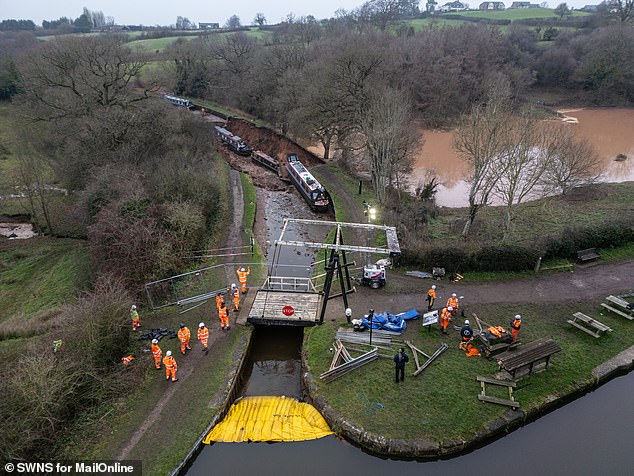 Workers were also seen positioning a boat turner amid the rescue operation