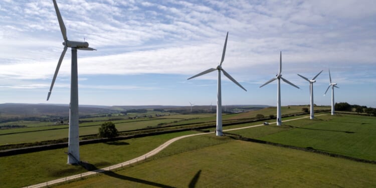 Britain spent £1.5bn in 2025 to turn off wind farms and fire up gas plants when electric grid couldn't cope