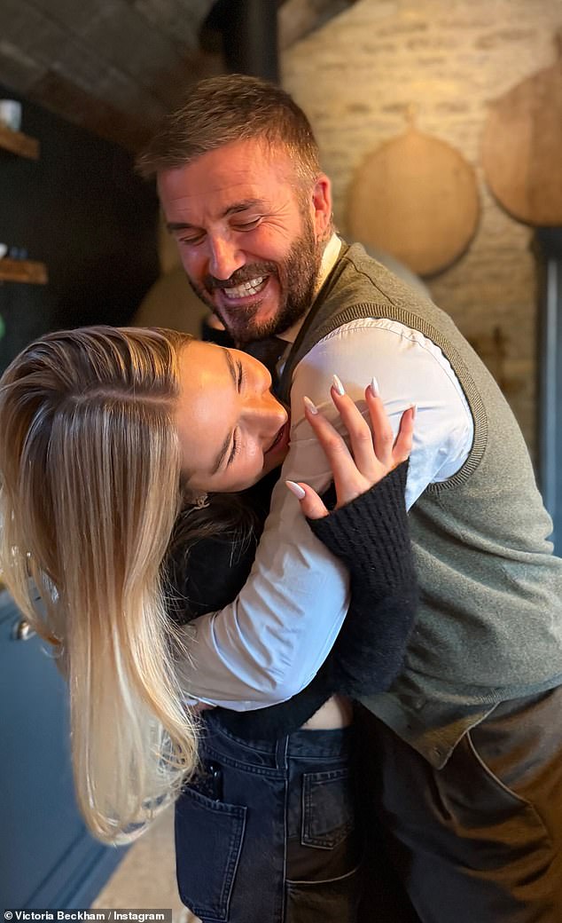 David doted on his daughter Harper, 14, as they shared a sweet embrace in snaps from Christmas Day - but Brooklyn has remained in the US