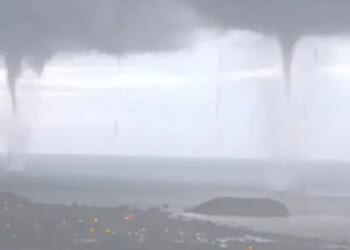 Moment THREE waterspout tornados strike at the same time off the coast of Spain in freak natural event