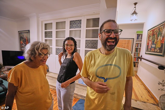 El-Fattah (pictured on right) landed in the UK on Boxing Day after almost ten years in Egyptian jails (file photo)