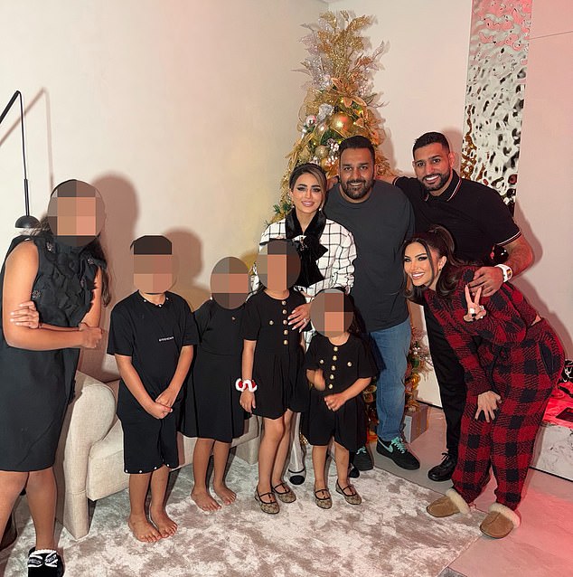 Ms Siddiqui was born and raised in London to Iraqi parents but now stars in hit Netflix reality show Dubai Bling. She is pictured here celebrating Christmas with British former professional boxer Amir Khan and his wife Faryal Makhdoom