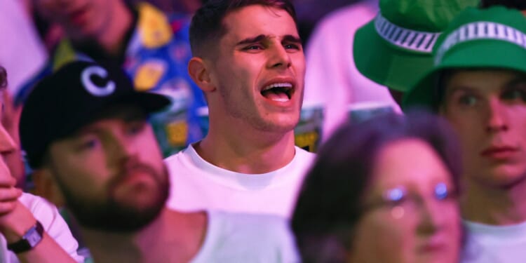 Premier League star hit with brutal chant after fans spot him at World Darts Championship