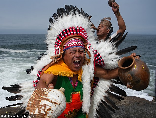 A group of shamans and healers from the coastal, Andean and Amazonian regions of Peru perform end-of-year ritual