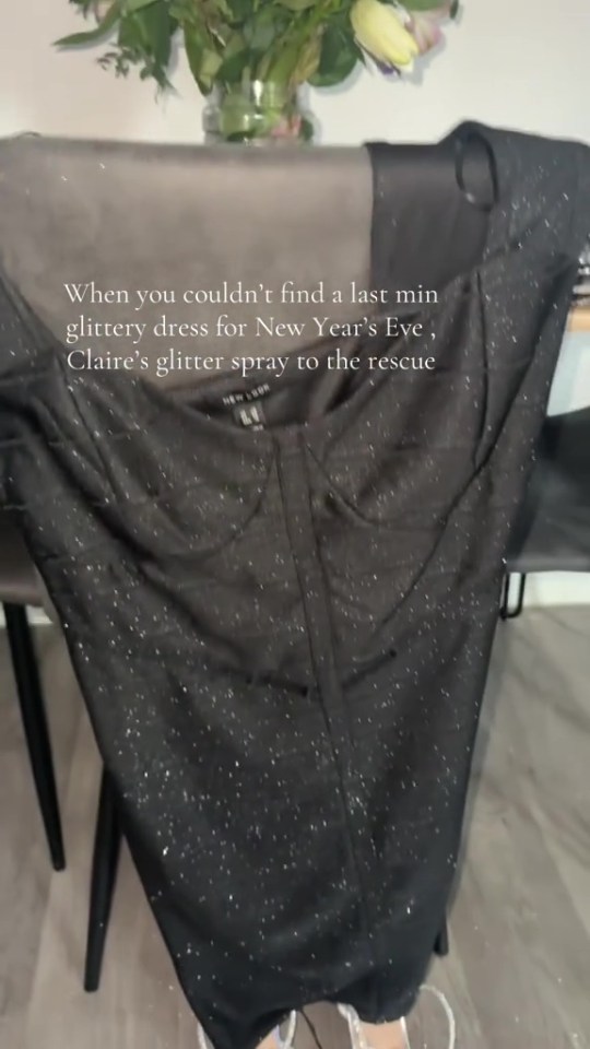 A black dress with added glitter for a New Year's Eve outfit.