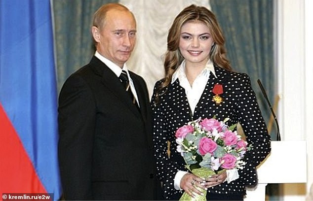 There is a woman's bedroom, presumably for Putin's longtime lover Alina Kabaeva, 42, and bedrooms for their sons aged ten and six. Pictured: Putin with Kabeva