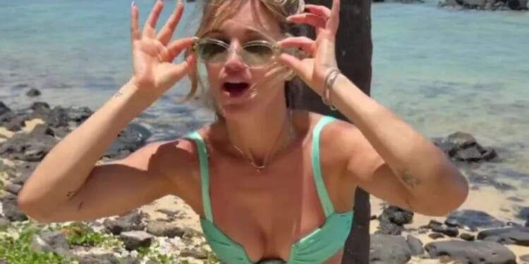 Ashley Roberts, 44, reveals her stunning figure in bikini as she shows off her Pussycat Dolls dance moves in Mauritius