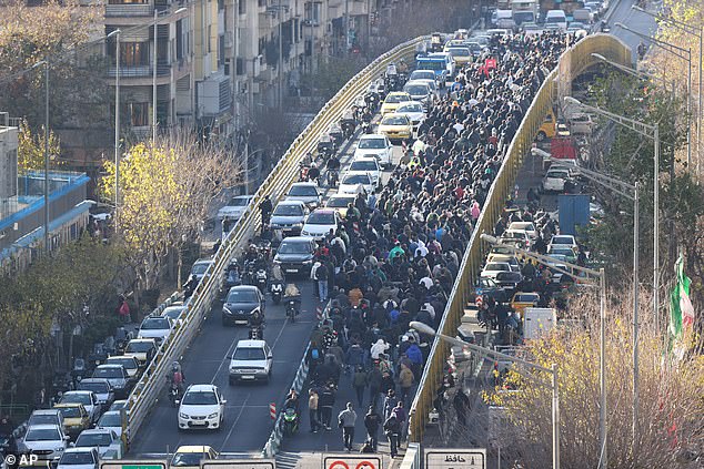 The image surfaced on social media overnight after Iran was rocked by its largest protests in three years. Pictured: Protesters march in Tehran on Monday, December 29, 2025