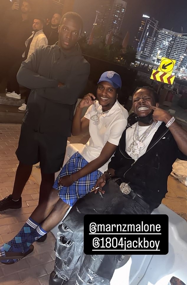 Shaw aka 'Malone' (pictured centre) regularly posts his friends on his social media. Shaw was locked up in 2021 for threatening rival gang members with a gun in Birmingham