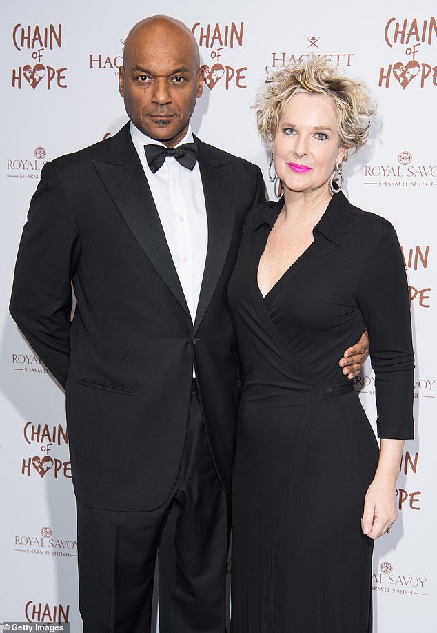 Salmon wept in court as he told of caring for his ill wife Fiona Hawthorne and their daughter Sasha - the couple are seen at the Chain Of Hope Gala Ball in London in November 2018