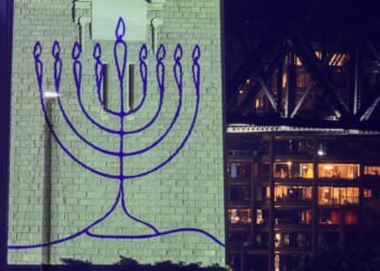 Sydney holds tribute to Bondi terror victims before New Year fireworks as Harbour Bridge is lit up in Jewish Menorah