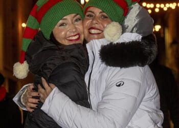 Sisters Lisi and Aura from Gran Canaria celebrate Hogmanay in Edinburgh, Scotland