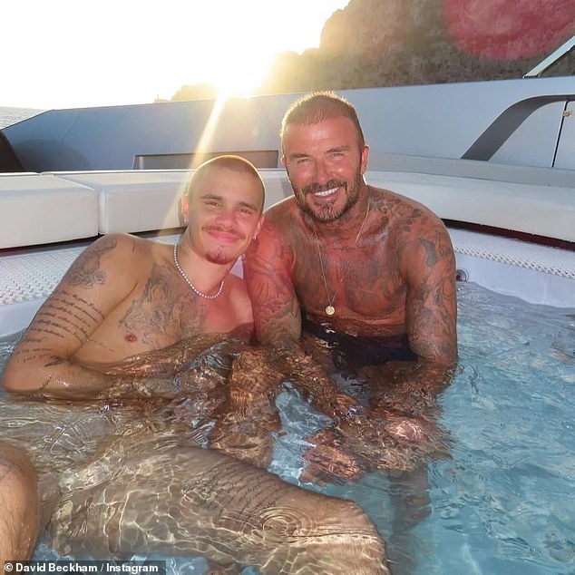 Sir David included photos with his other three children Romeo, (pictured), Cruz, and Harper enjoying family holidays and celebrations together over the past 12 months