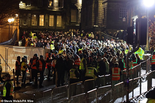 People going through security to enter the Hogmanay New Year celebrations in Edinburgh