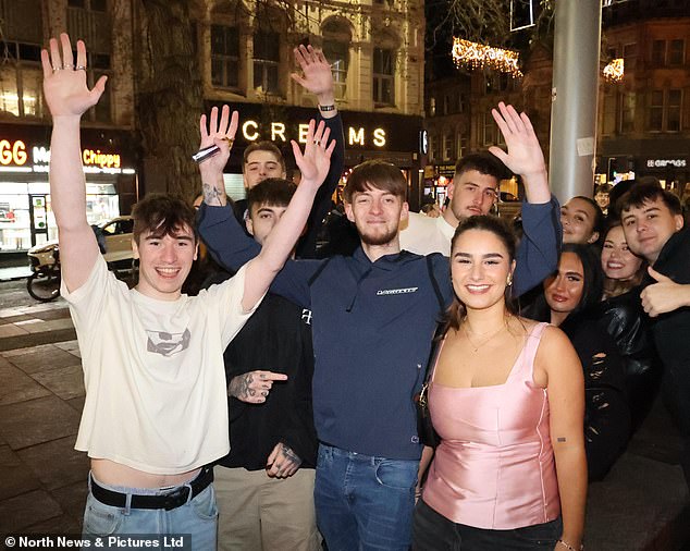 A group of friends are feeling cheery as they welcome in the New Year