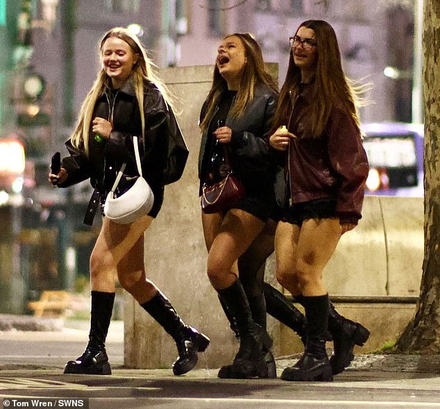 Three young women in Bristol braving the cold as they gear up to ring in the New Year