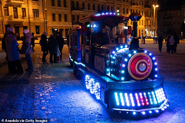 A light up train in Kiyv as Ukrainians celebrate the New Year