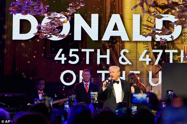 Once inside, Trump turned emcee to help auction off a painting of Jesus done by artist Vanessa Horabuena. It ended up going for $2.75million, as Trump joked he'd be happy to sign it if it went for more