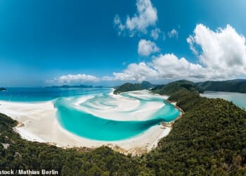 Police received reports of a lifeless body in the water at Whitehaven Beach, off the Queenslandcoast, about 11am on Wednesday (the beach is pictured)