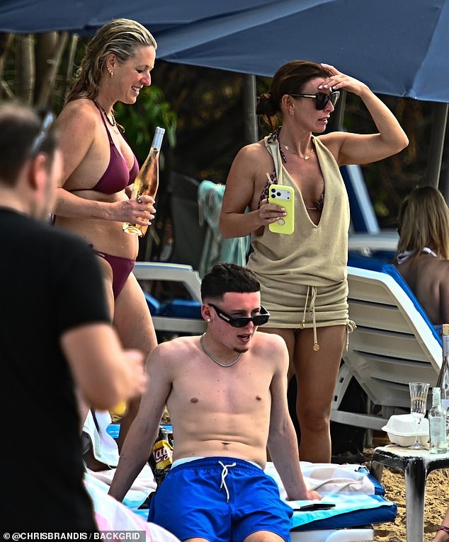 The family looked to be having a lovely time as they tucked into their Lays crisps and wine