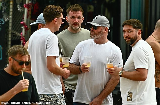 The group looked to be enjoying a round of drinks