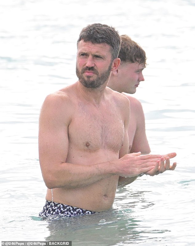 Former footballer Michael Carrick took a dip in the sea