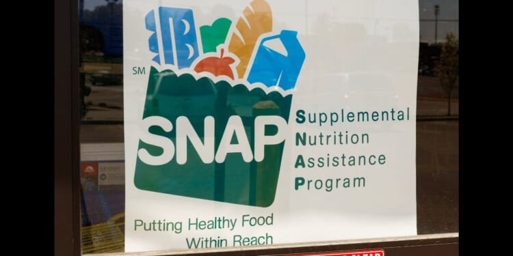 A sign at a retailer for SNAP, the Supplemental Nutrition Assistance Program.