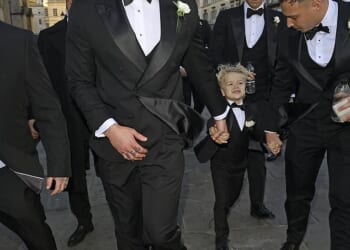 Adam Peaty has arrived at his wedding hand in hand with his adorable son George as he prepares to marry Holly Ramsay at Bath Abbey on Saturday
