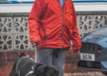 Adam Peaty' dad Mark has been pictured the day after his son's wedding to Holly Ramsay as he enjoyed a dog walk near their family home in Staffordshire