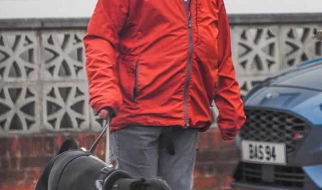 Adam Peaty' dad Mark has been pictured the day after his son's wedding to Holly Ramsay as he enjoyed a dog walk near their family home in Staffordshire