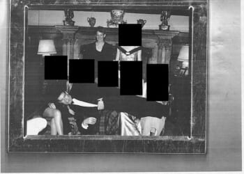 A picture of Andrew Mountbatten-Windsor lying across row of women in photo during black-tie event with Ghislaine Maxwell has been released as part of the Epstein files