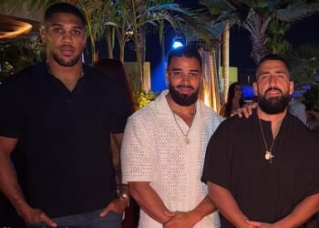 Anthony Joshua is pictured with friends Latif Ayodele (centre) and Sina Ghami (right) who both died in the crash