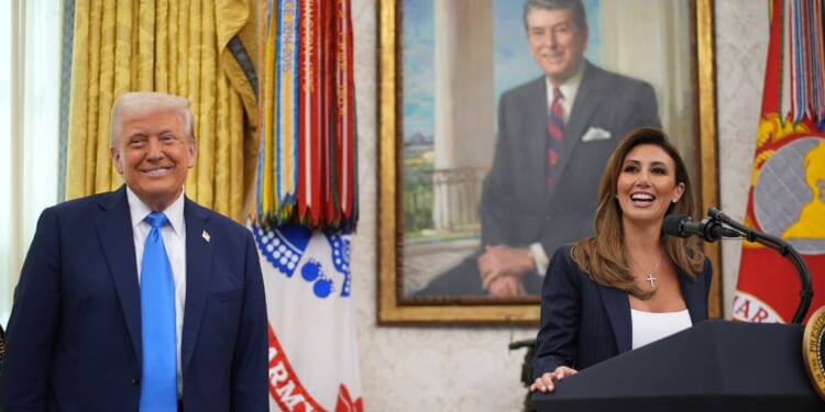 President Donald Trump listens as White House Presidential Counselor Alina Habba delivers remarks before being sworn in as the interim U.S. Attorney for New Jersey March 28 in the Oval Office at the White House in Washington, D.C.